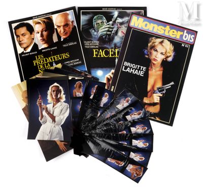 a lot of movies that are on display on the table