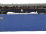 a blue box with a black train car on it