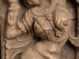 statue of a woman holding a sword in her right hand