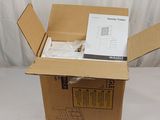 a cardboard box that is open on a white surface