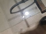 a person standing on a tile floor with their feet on the floor