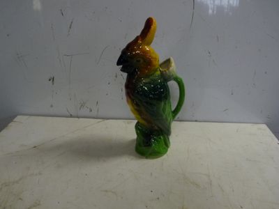 a figurine of a bird with a hat on it ' s head