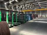 a large warehouse filled with lots of steel rods