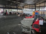 a large warehouse with a lot of machinery in it