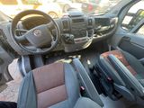 a view of the interior of a vehicle from the driver ' s seat