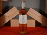 a bottle of wine that is sitting on a table