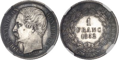 a close up of a coin with a man ' s face on it