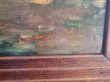 an image of a close up of a painting on a wooden table