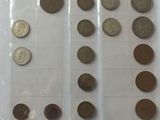 a lot of coins that are sitting on a table