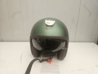 a helmet with a tag on it sitting on a table
