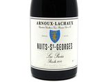 a bottle of wine that is sitting on a table