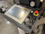 an image of a machine that is working on a piece of paper