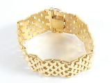 bracelet made of gold and diamonds on a white background
