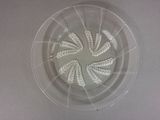 a picture of a plastic plate with a circular design on it