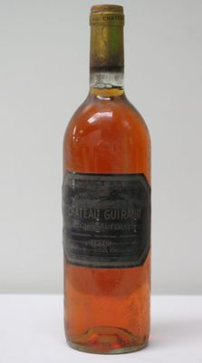 a bottle of alcohol that is sitting on a table
