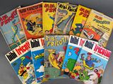 several comics are stacked on top of each other on a table