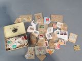 a suitcase full of stamps sitting on a table