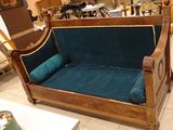 a couch that is sitting in the middle of a room