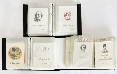 plusieurs livres sont empilés sur une surface blanche
