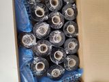 a box full of rolls of tape sitting on a table