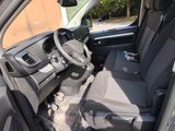 the interior of a car with a steering wheel and a dashboard