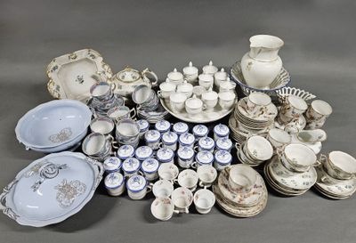 many different types of porcelain dishes and bowls on the table