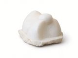 marble figurine of a white cat on a white background