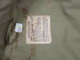 a label on the back of a military jacket