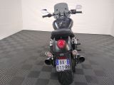 a motorcycle that is parked in a garage