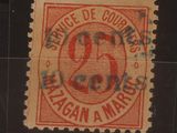 un vieux timbre-poste sur lequel figure le chiffre 25