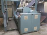 a machine that is sitting inside of a building