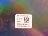 a picture of a close up of a sticker with a rainbow in the background