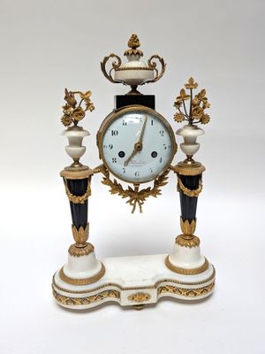 a clock that is sitting on top of a table
