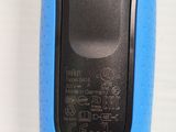 a close up of a cell phone with a blue case