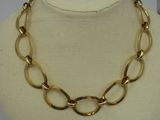 a close up of a necklace on a mannequin mannequin