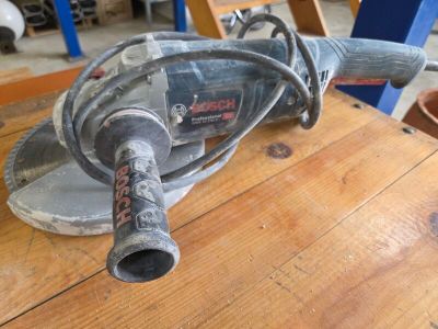 a small machine that is sitting on a wooden table