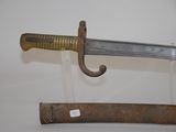a sword that is on display on the wall