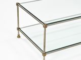 rectangular glass coffee table with brass legs and casteors