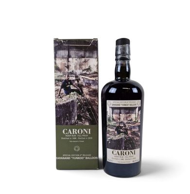 a bottle of caroni with a box on the side