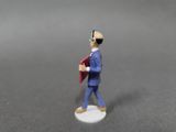 a figurine of a man in a suit and sunglasses