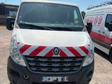 a white van with red stripes parked in a parking lot