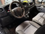 the interior of a car with a steering wheel and a dashboard