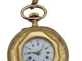 gold plated pocket watch with roman numerals and roman numerals