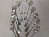 a lot of forks and spoons arranged in a circle