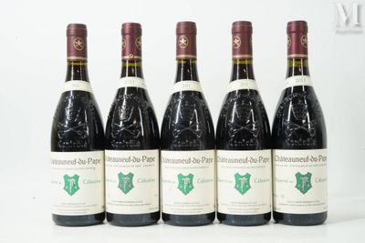 six bottles of wine are lined up in a row on a table