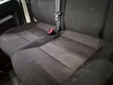 a seat belt that is attached to the back of a car
