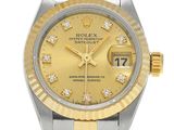 rolex lady ' s watch with yellow dial and diamond bezel