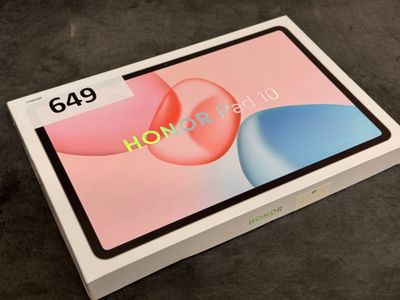 a close up of a box with a tablet on top of it