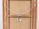 an old wooden easel with a piece of paper hanging on it