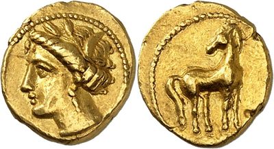 a gold coin with an image of a horse on it